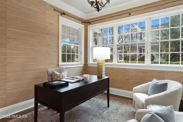 a living room with furniture and a window