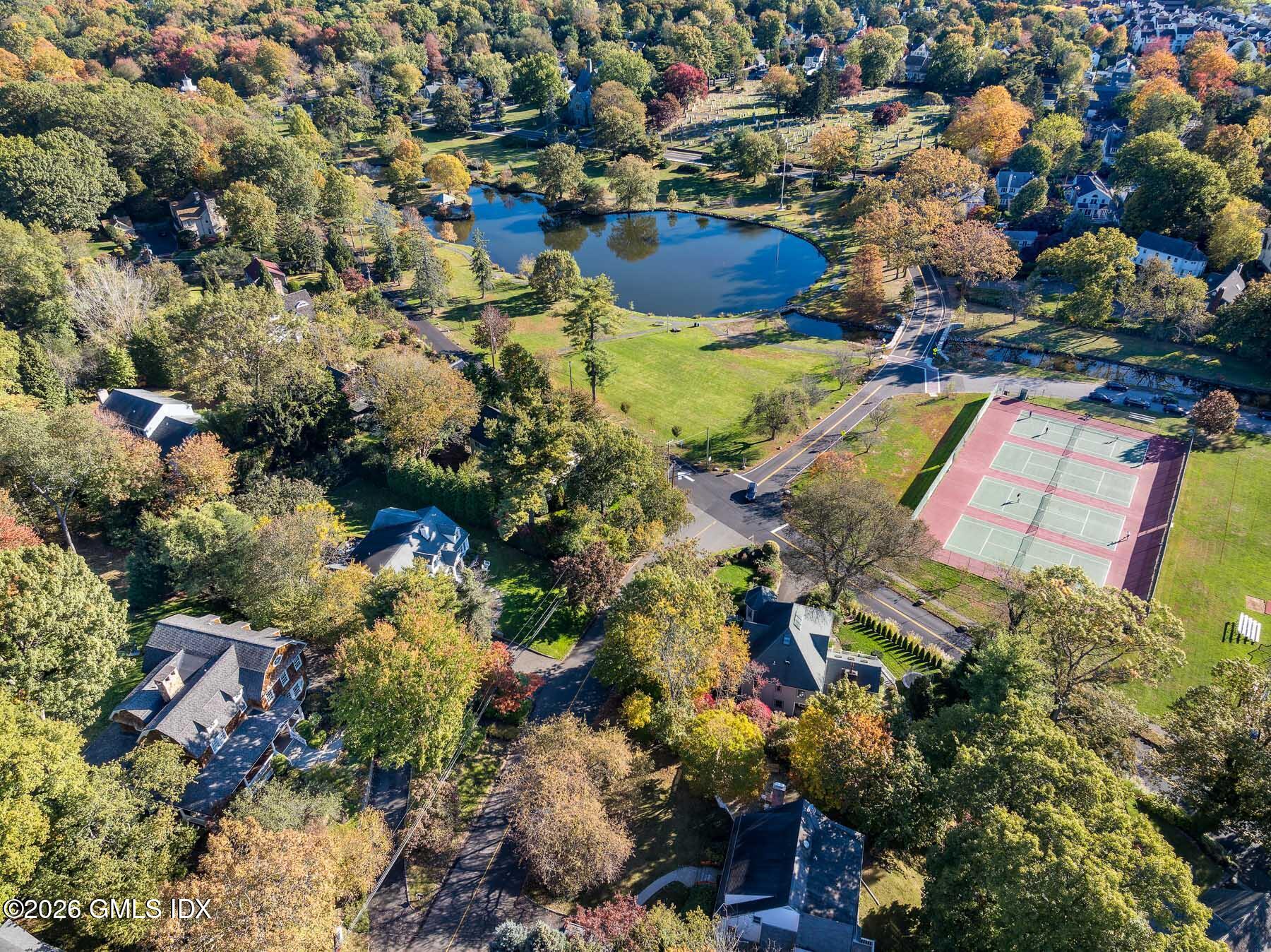 63 Wesskum Wood Road Riverside, CT 06878 - Photo 26 of 26 an aerial view of residential house with outdoor space and swimming pool