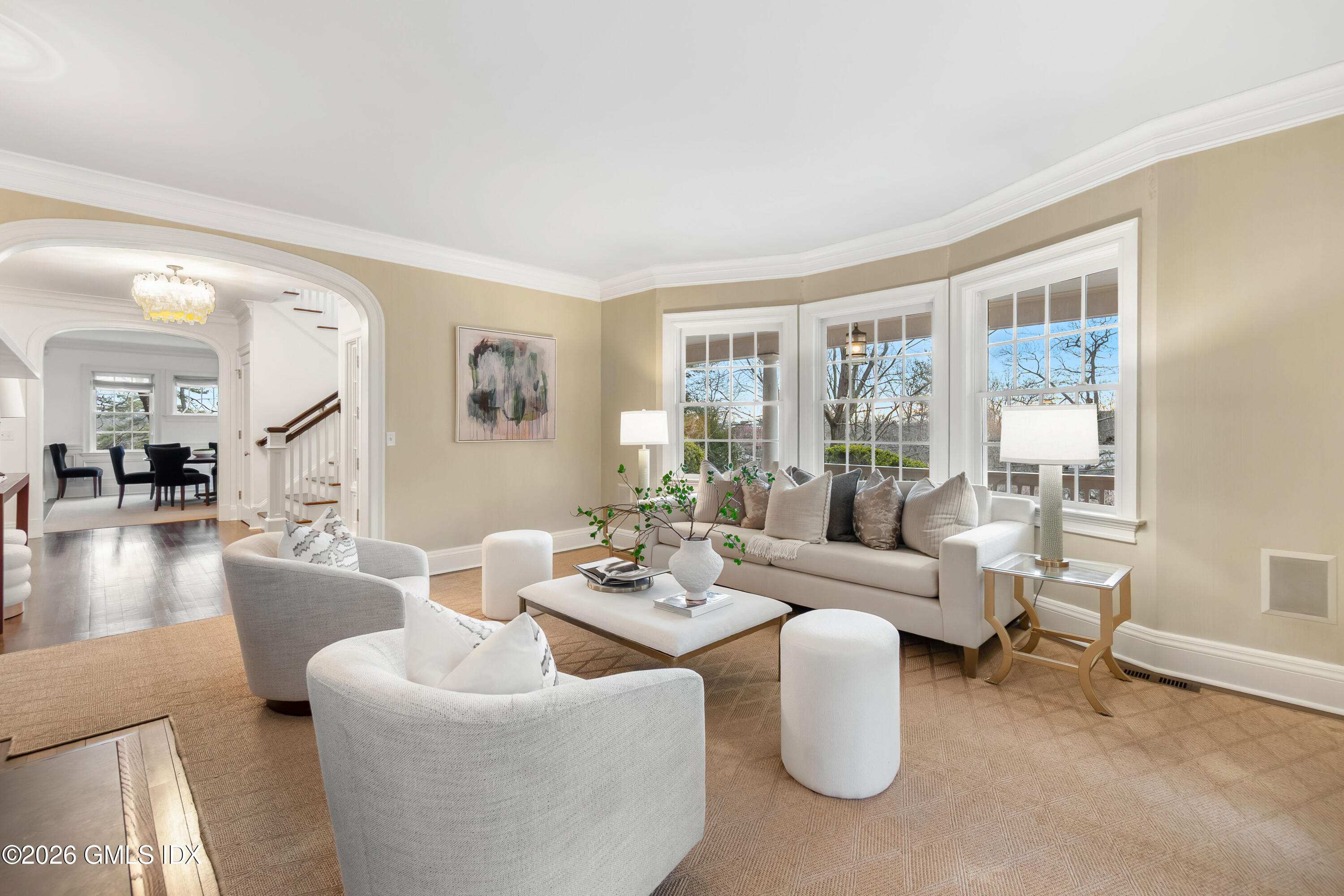63 Wesskum Wood Road Riverside, CT 06878 - Photo 6 of 26 a living room with furniture and a large window