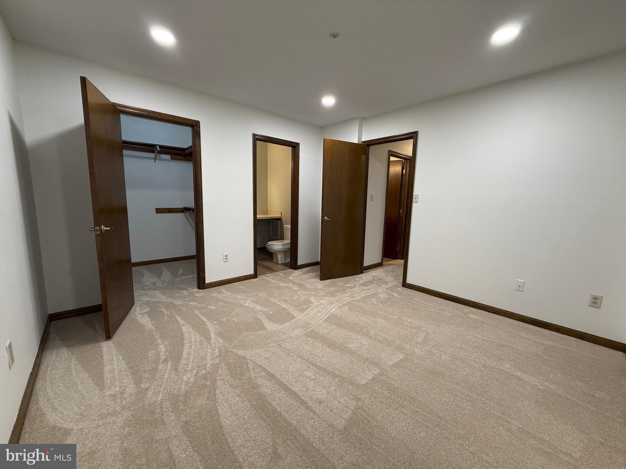 44790 Locust Ridge Court, Unit 9B California, MD 20619 - Photo 11 of 14 Master bedroom with half bath and walk in closet