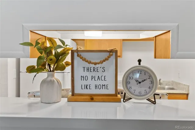 a picture of a table and a vase of flowers sitting on a table