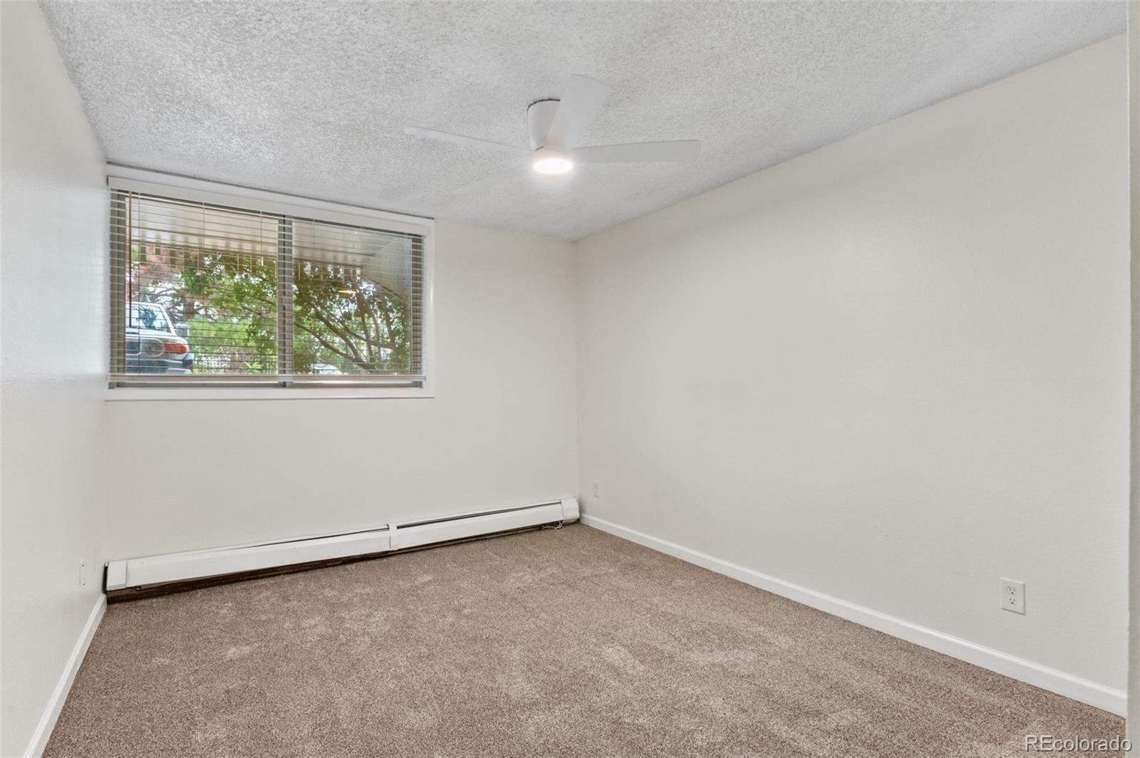 2707 Valmont Road, Unit 106 Boulder, CO 80304 - Photo 17 of 38 an empty room with a window