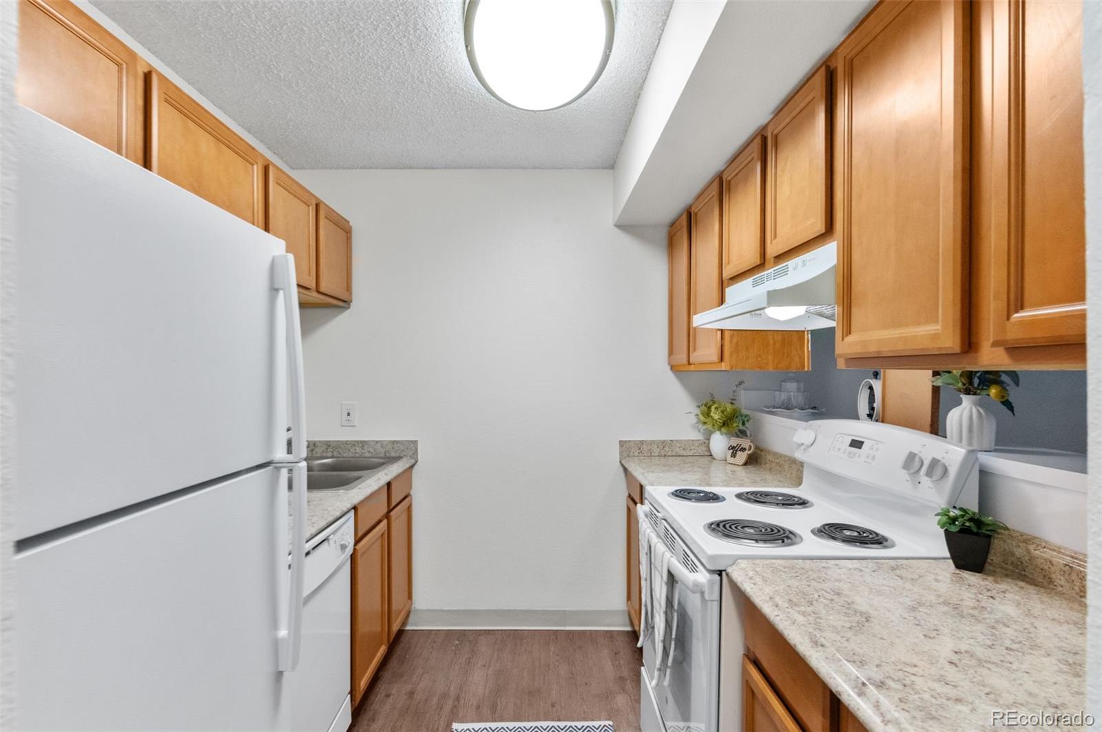 2707 Valmont Road, Unit 106 Boulder, CO 80304 - Photo 2 of 38 a utility room with dryer and washer
