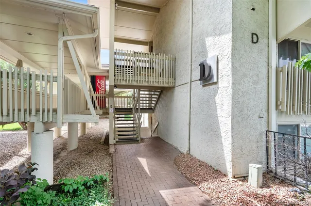 a view of a living room and entry way