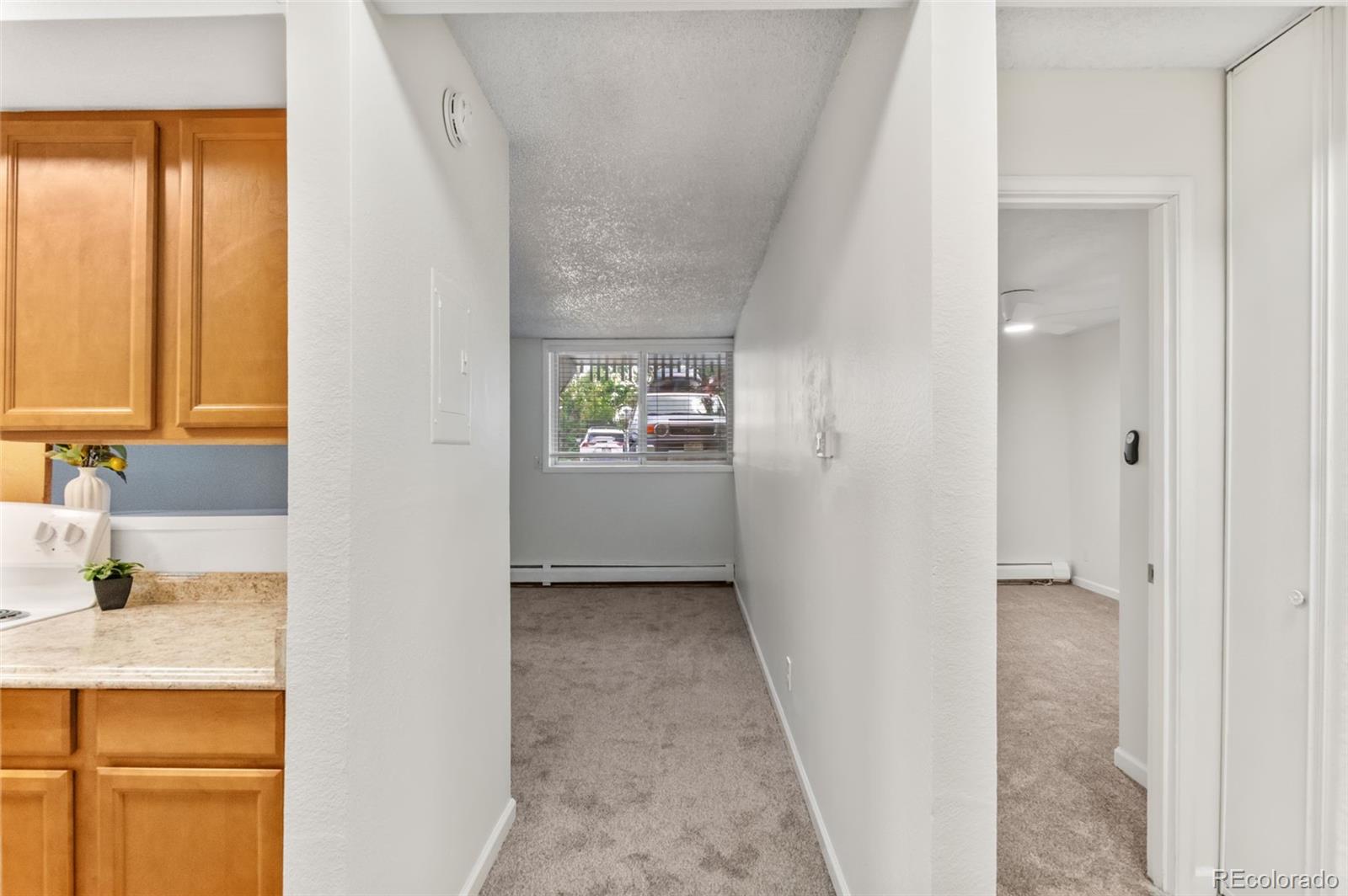 2707 Valmont Road, Unit 106 Boulder, CO 80304 - Photo 6 of 38 a bathroom with a sink and a mirror