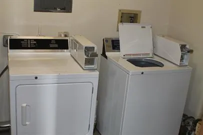 a utility room with washer and dryer
