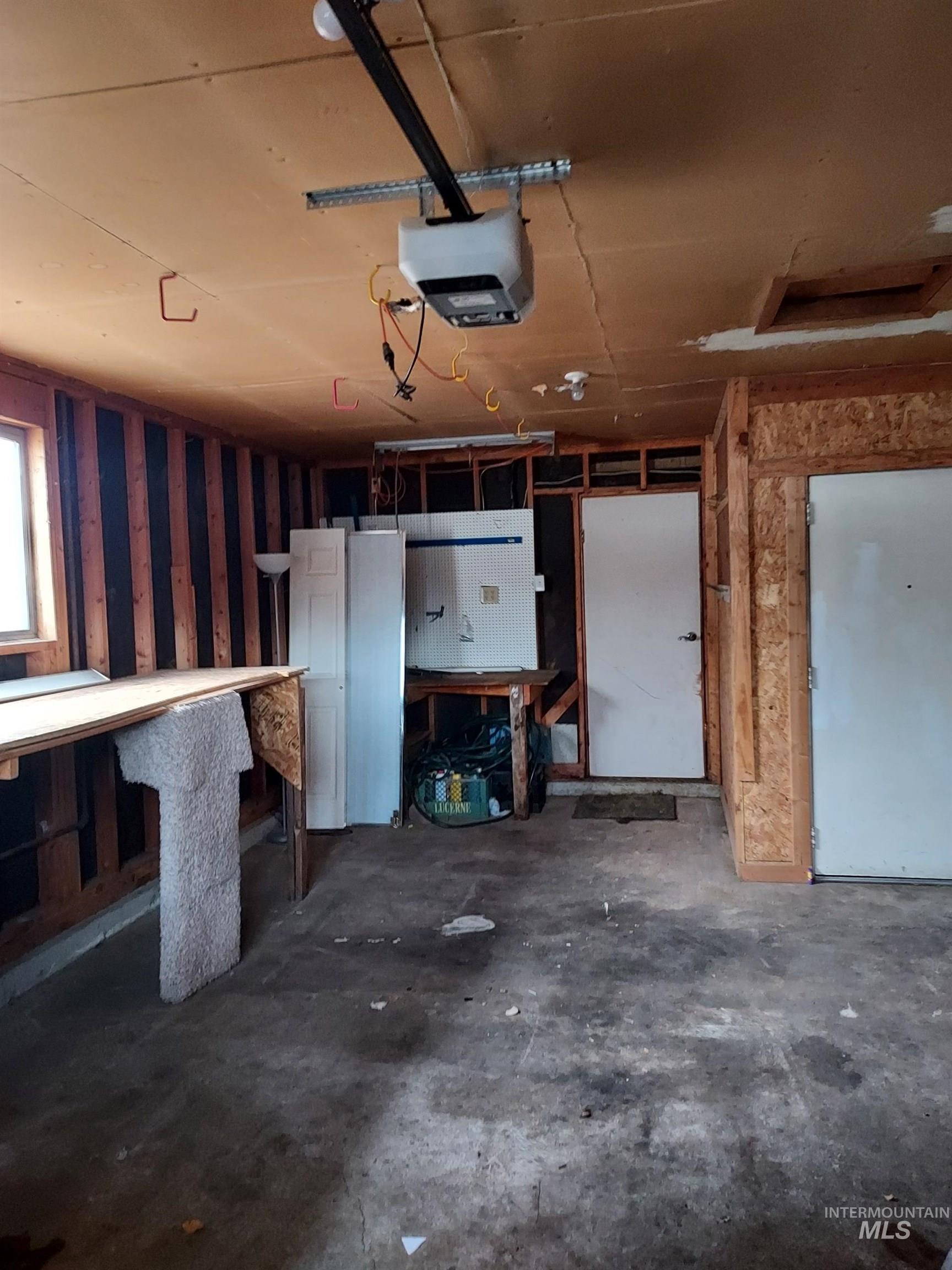 6295 West Grandview Place Boise, ID 83709 - Photo 22 of 29 Garage with a garage door opener