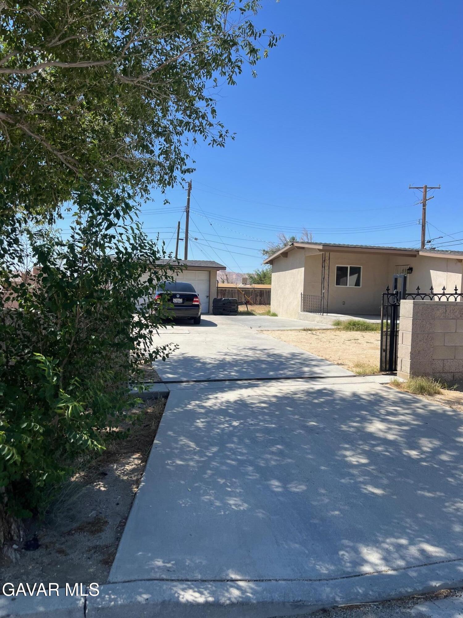3354 Arthur Avenue Mojave, CA 93501 - Photo 2 of 12 a view of a backyard of the house