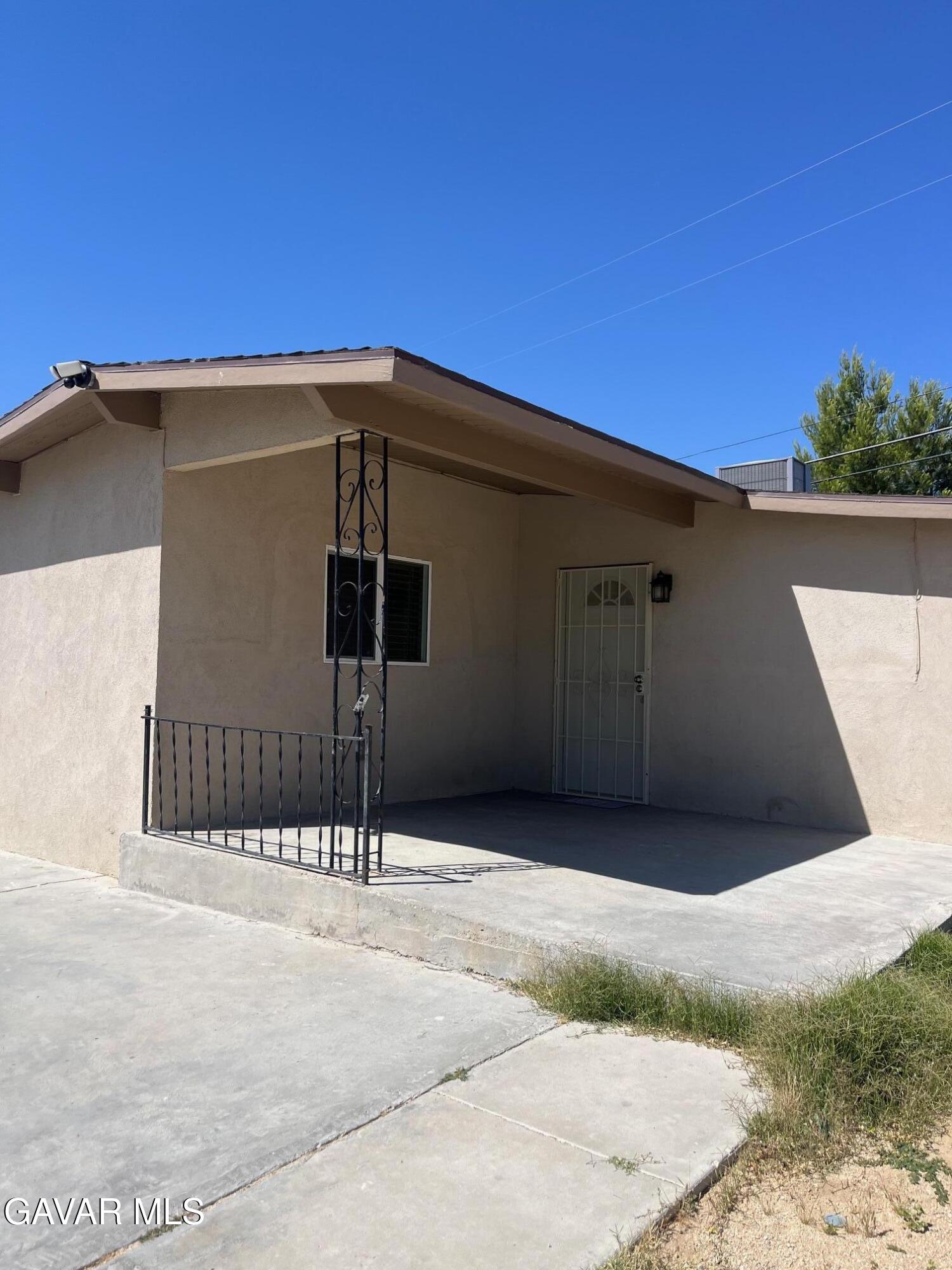 3354 Arthur Avenue Mojave, CA 93501 - Photo 5 of 12 a side view of a house