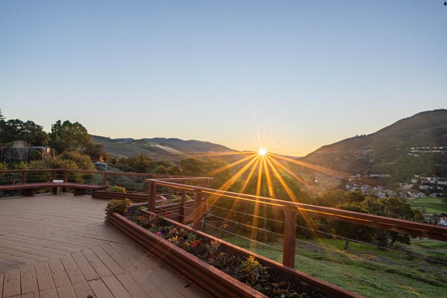 10000 Eddy Road Carmel, CA 93923 - Photo 2 of 37 a view of a roof deck with couches and wooden floor