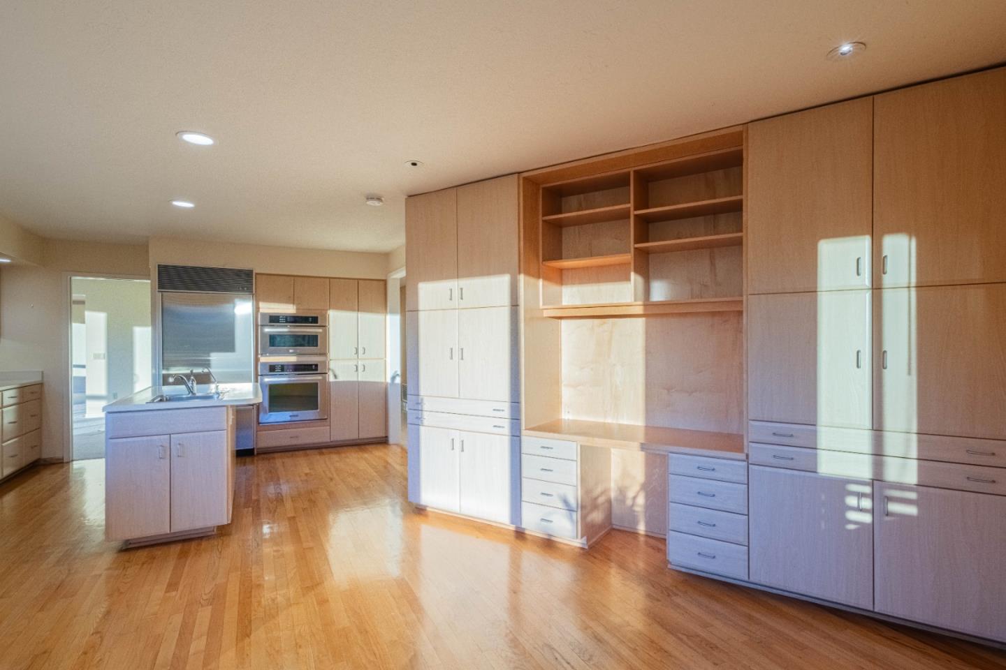 10000 Eddy Road Carmel, CA 93923 - Photo 22 of 37 a room with wooden floors and windows