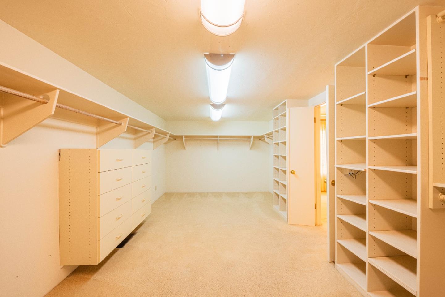 10000 Eddy Road Carmel, CA 93923 - Photo 24 of 37 a view of walk in closet with empty racks