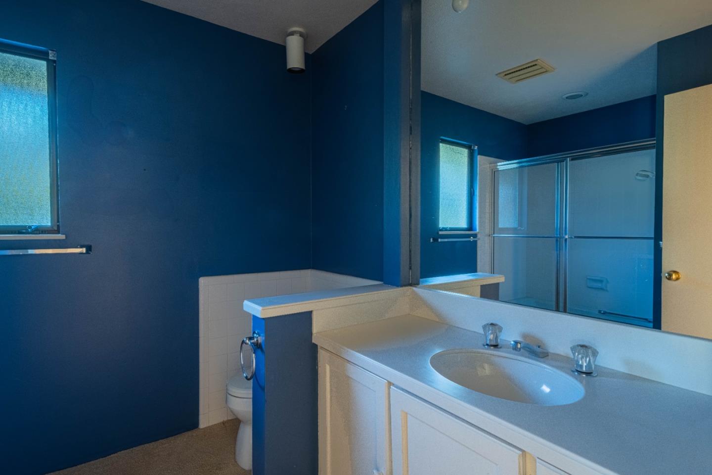 10000 Eddy Road Carmel, CA 93923 - Photo 29 of 37 a bathroom with a sink and a mirror