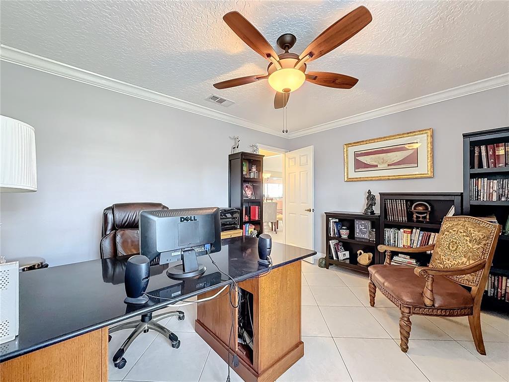 2686 Southwest Fairgreen Road Port St. Lucie, FL 34987 - Photo 19 of 36 a living room with furniture