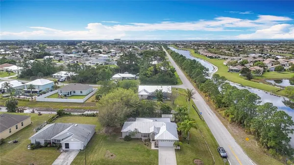 $395,000 | 2686 Southwest Fairgreen Road, Port St. Lucie, FL 34987