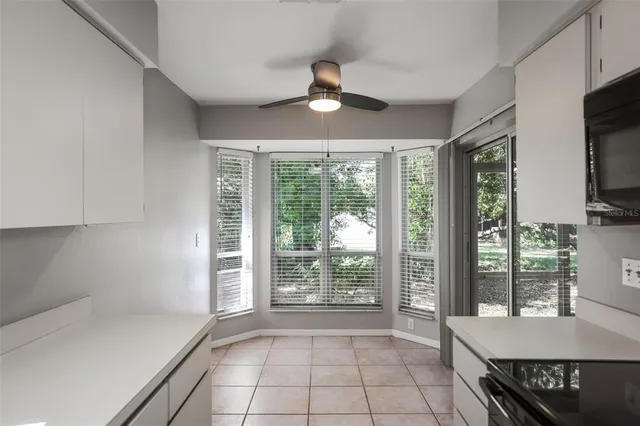 a view of a livingroom with furniture window and outside view