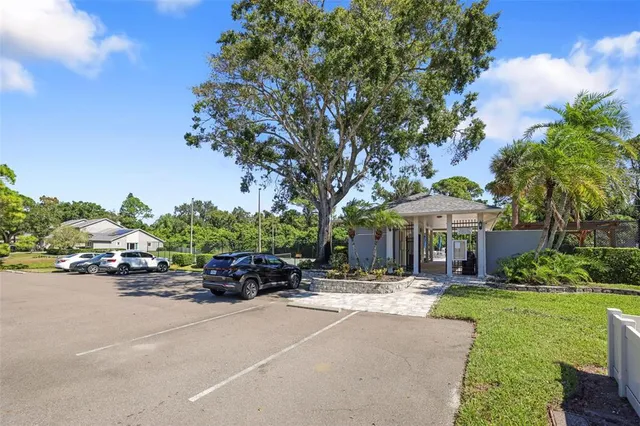 a view of a swimming pool with a yard