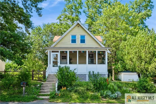 a house view with a garden space