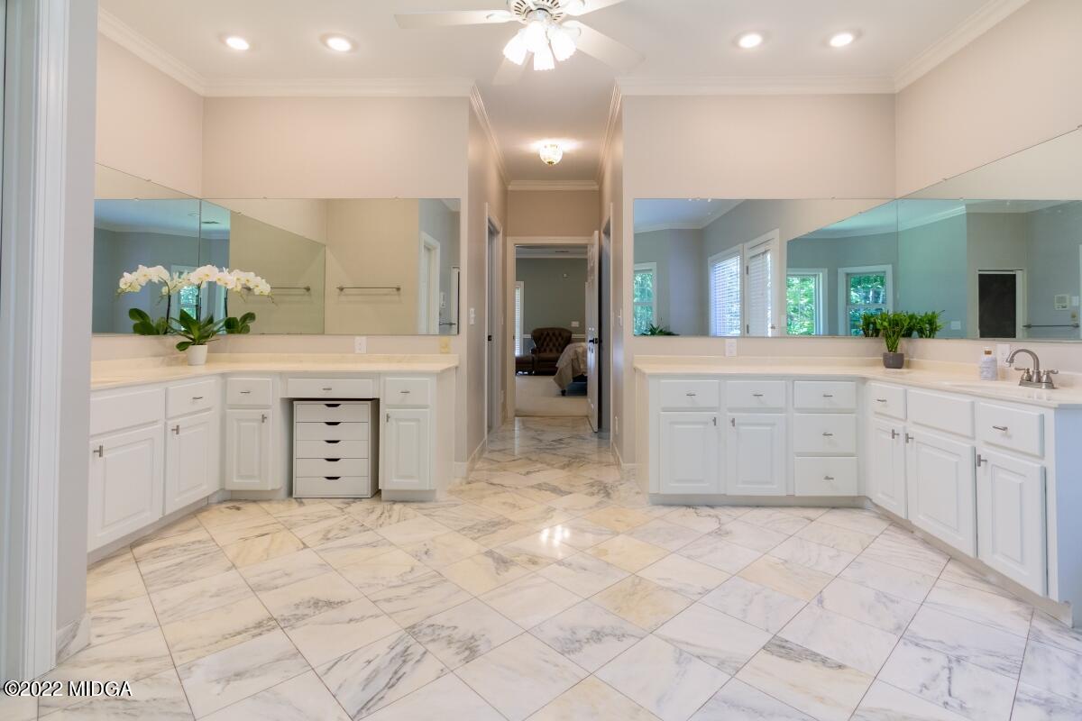 331 Country Creek Road Macon, GA 31220 - Photo 17 of 36 a bathroom with a sink a vanity and a mirror