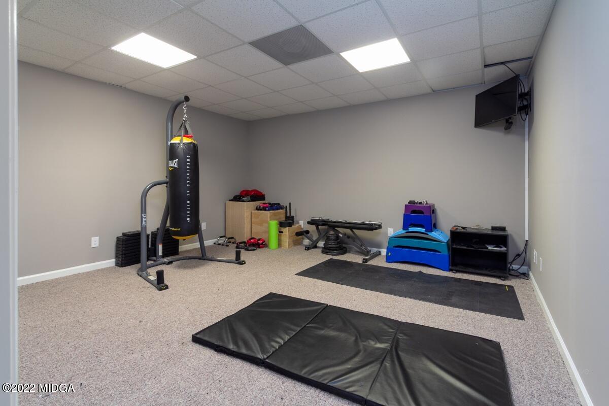 331 Country Creek Road Macon, GA 31220 - Photo 23 of 36 a view of a room with gym equipment