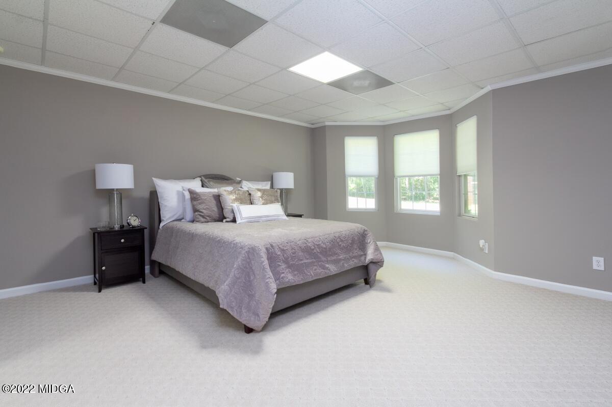 331 Country Creek Road Macon, GA 31220 - Photo 26 of 36 a bedroom with a bed and window