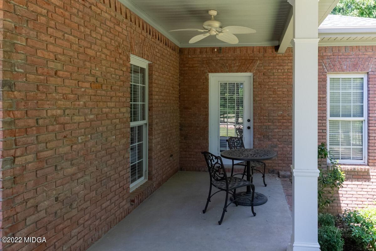 331 Country Creek Road Macon, GA 31220 - Photo 32 of 36 a view of a dining room with a table and chairs