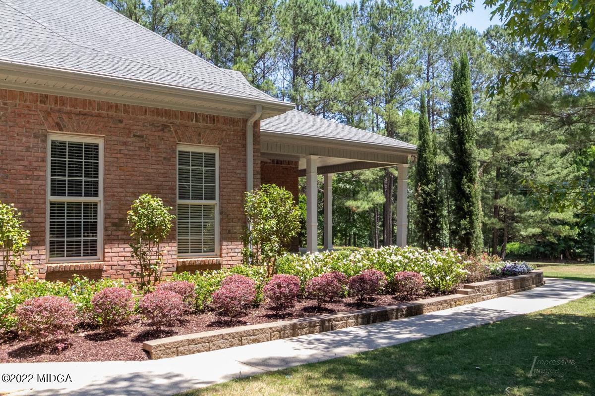 331 Country Creek Road Macon, GA 31220 - Photo 33 of 36 a front view of a house with garden