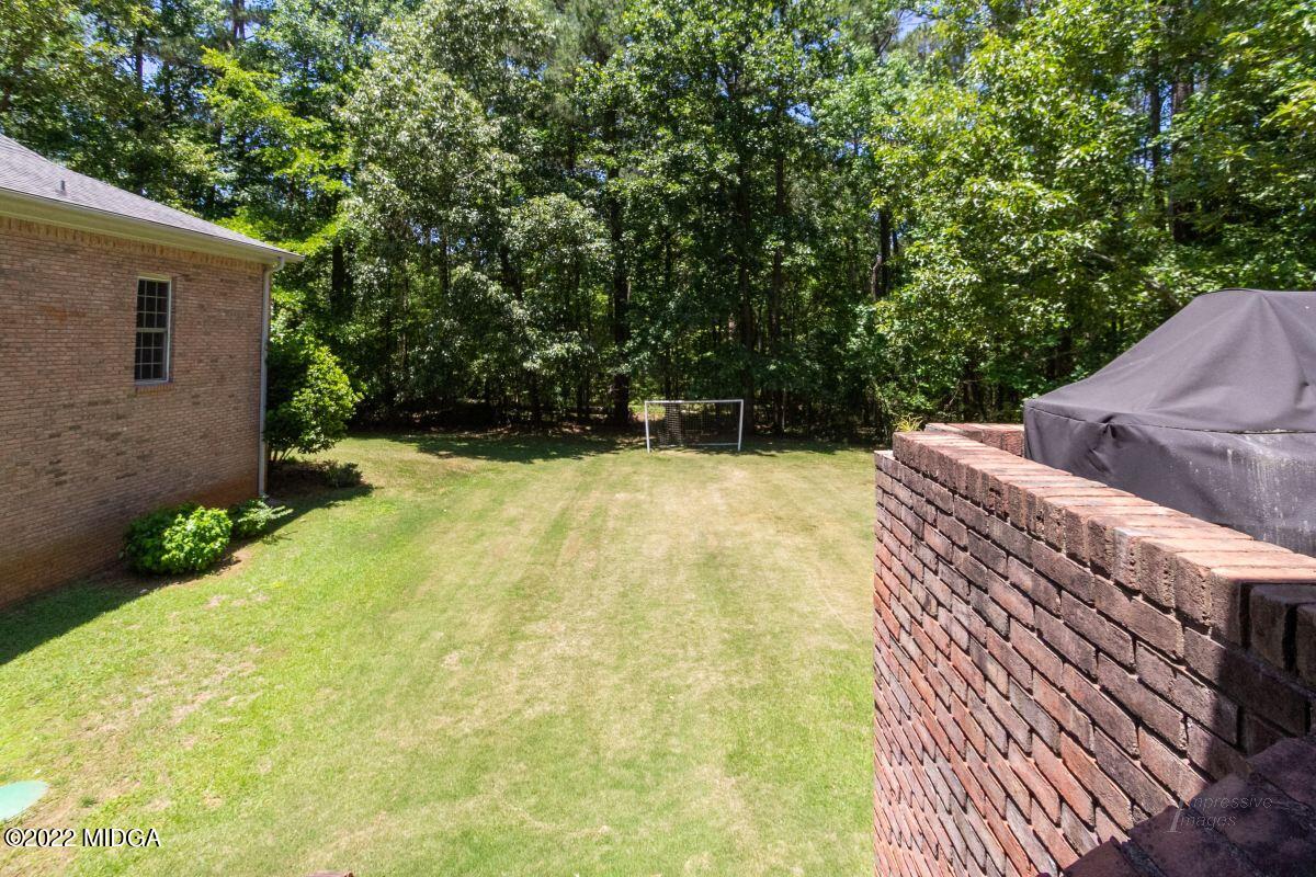 331 Country Creek Road Macon, GA 31220 - Photo 35 of 36 a view of swimming pool with seating area