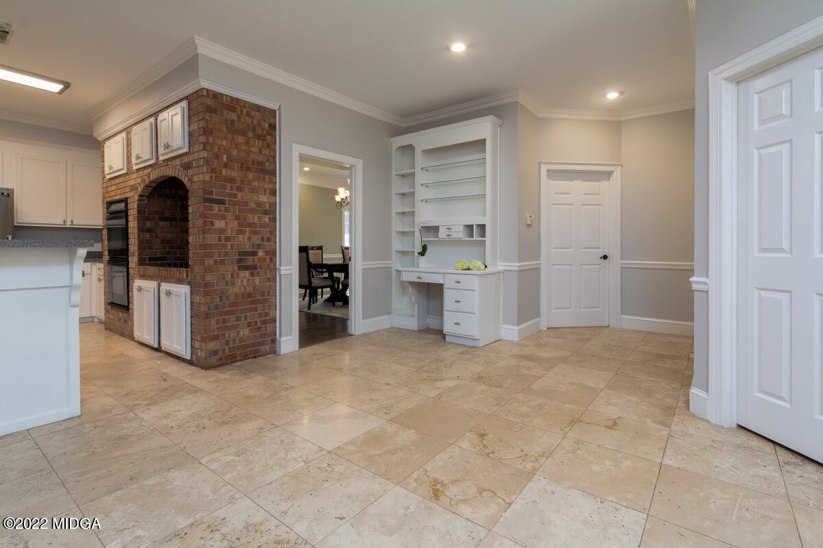 331 Country Creek Road Macon, GA 31220 - Photo 6 of 36 a view of an empty room with a fireplace