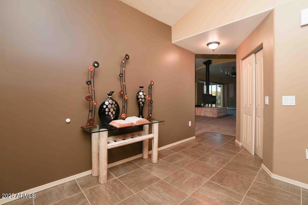 4330 East Navajo Lane Rimrock, AZ 86335 - Photo 14 of 59 a living room with furniture a rug and white walls