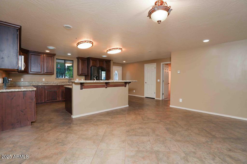 4330 East Navajo Lane Rimrock, AZ 86335 - Photo 23 of 59 a view of kitchen with kitchen island a sink stainless steel appliances and cabinets