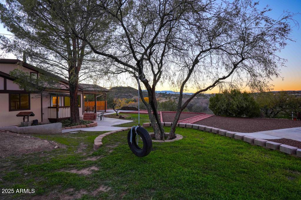 4330 East Navajo Lane Rimrock, AZ 86335 - Photo 6 of 59 a view of a house with backyard porch and sitting area
