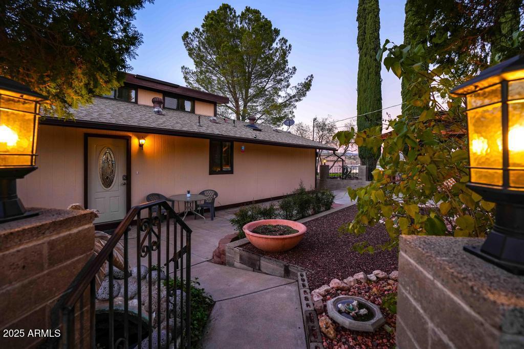 4330 East Navajo Lane Rimrock, AZ 86335 - Photo 9 of 59 a backyard of a house with barbeque oven table and chairs