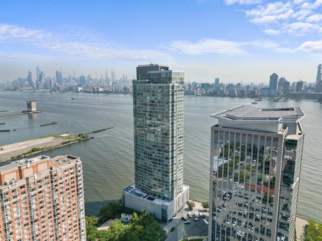 2 2nd Street, Unit 4001 Jersey City, NJ 07302 - Photo 25 of 31 a view of a city with tall buildings