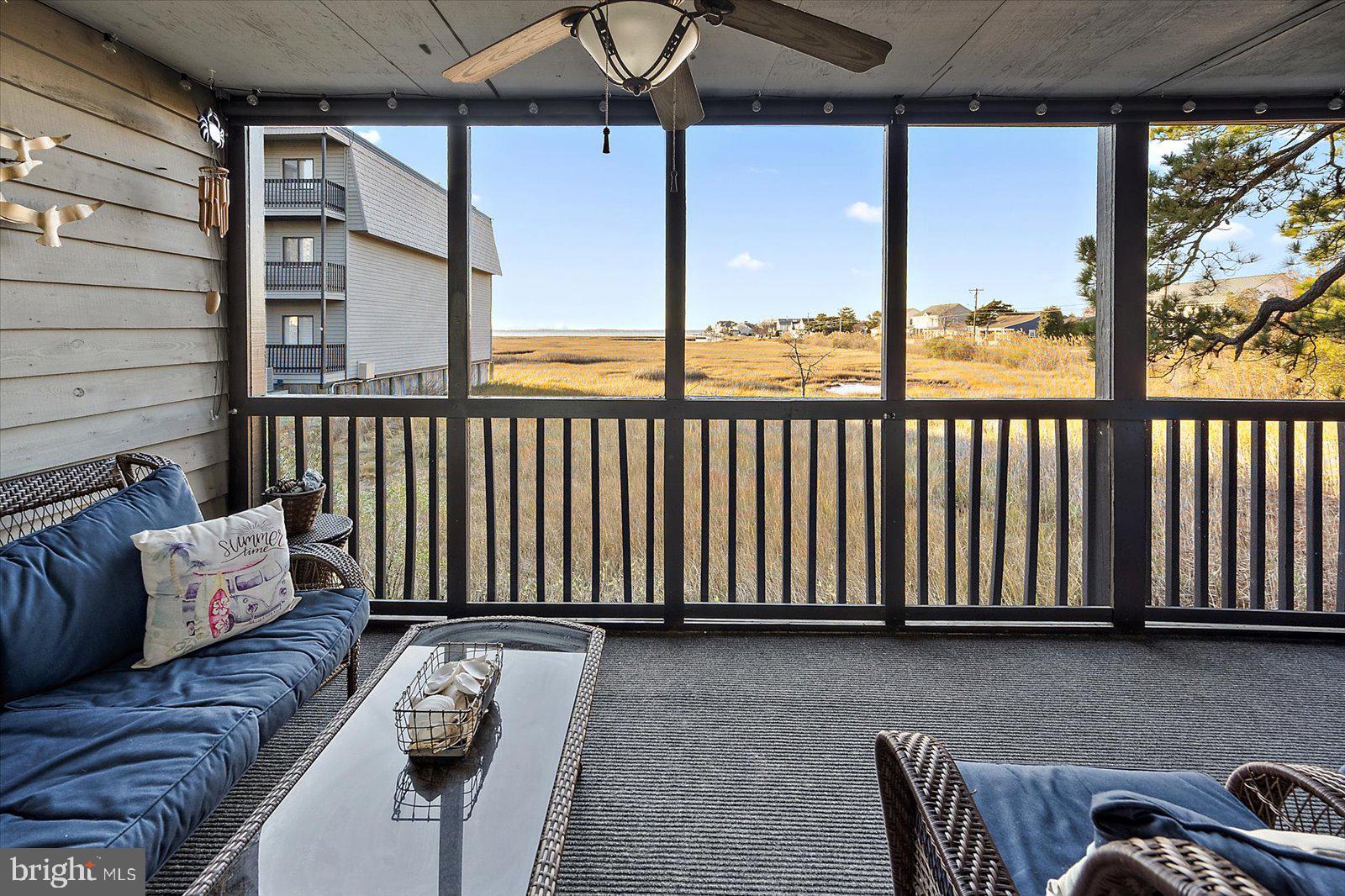 119 Old Landing Road, Unit 102A Ocean City, MD 21842 - Photo 21 of 47 a view of a couch in the roof deck