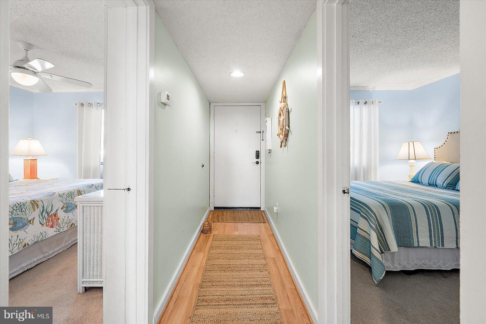 119 Old Landing Road, Unit 102A Ocean City, MD 21842 - Photo 22 of 47 a en suite bathroom with a sink and a mirror