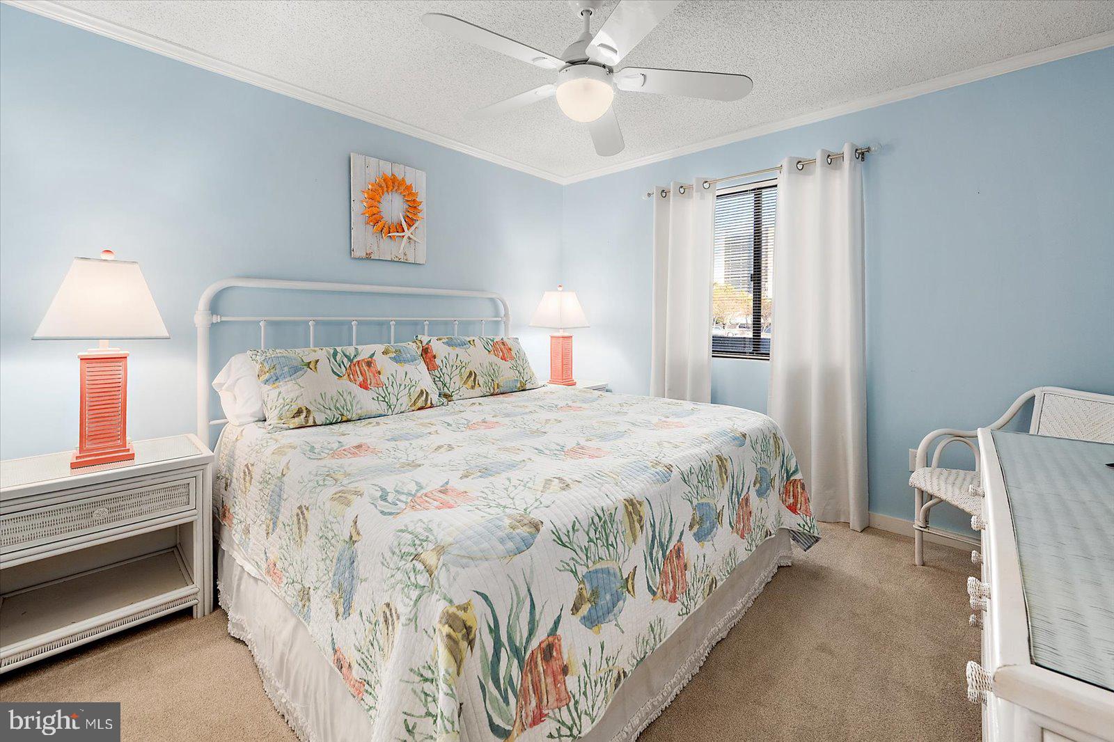 119 Old Landing Road, Unit 102A Ocean City, MD 21842 - Photo 23 of 47 a bedroom with a bed and a window