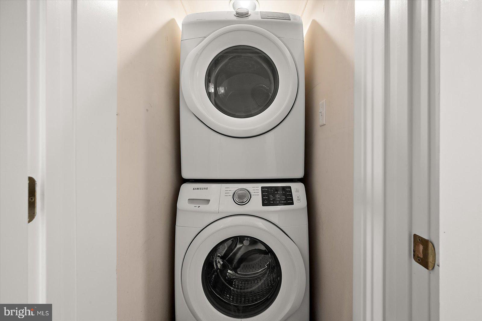 119 Old Landing Road, Unit 102A Ocean City, MD 21842 - Photo 31 of 47 a utility room with dryer and washer