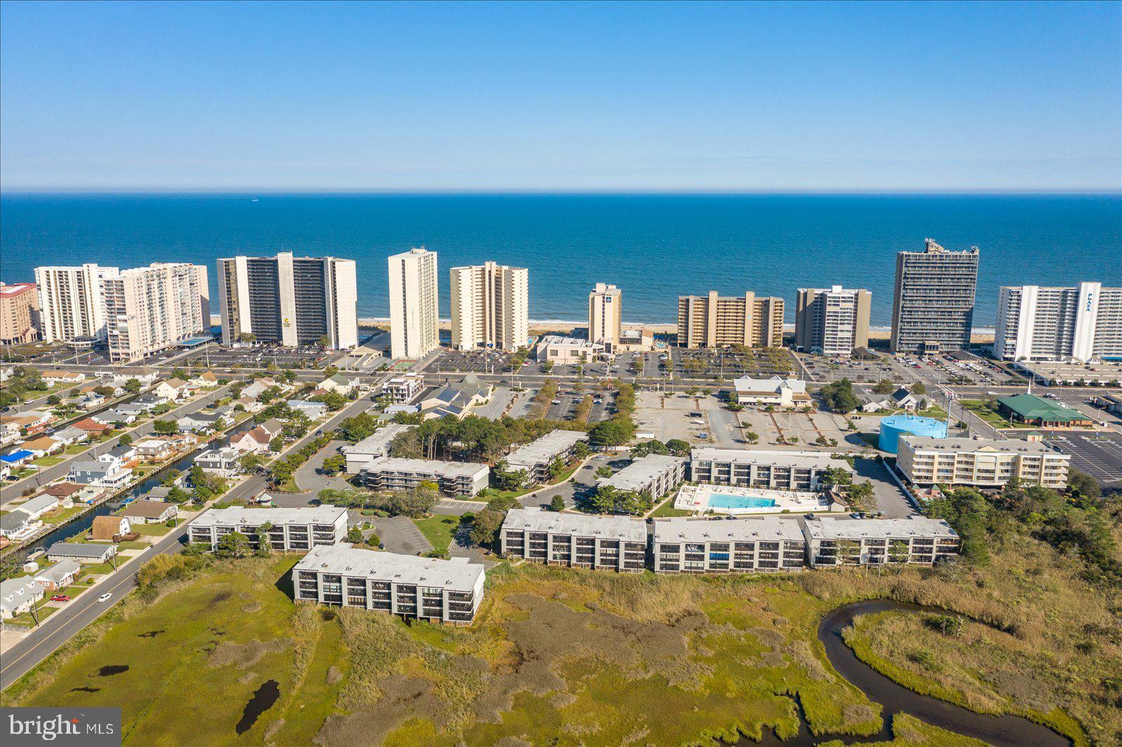 119 Old Landing Road, Unit 102A Ocean City, MD 21842 - Photo 37 of 47 a view of a city with tall buildings