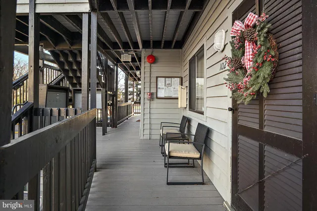 a view of swimming pool of water with tall buildings