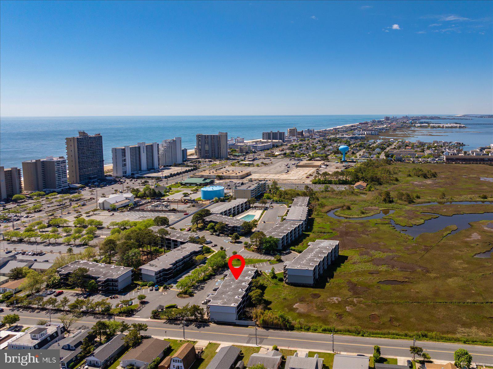 119 Old Landing Road, Unit 102A Ocean City, MD 21842 - Photo 46 of 47 an aerial view of residential houses with outdoor space