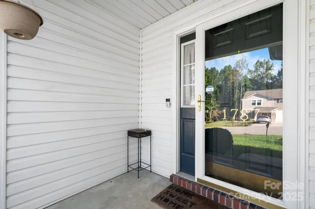 a view of a porch with furniture