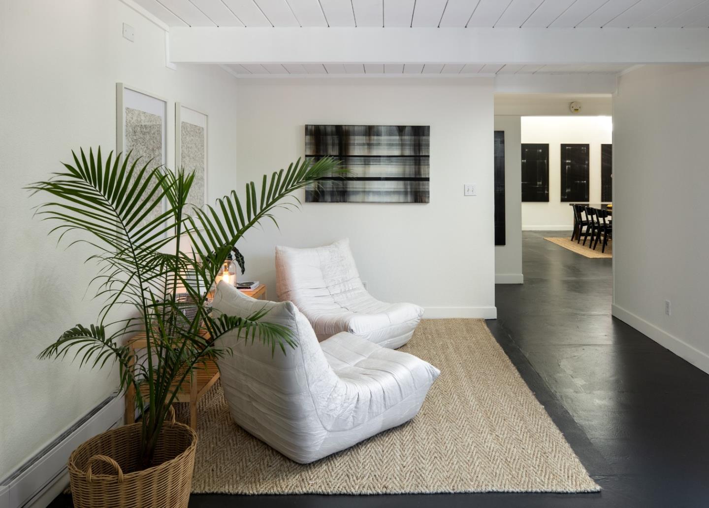 840 Sutter Avenue Palo Alto, CA 94303 - Photo 20 of 26 a living room with furniture and a floor to ceiling window
