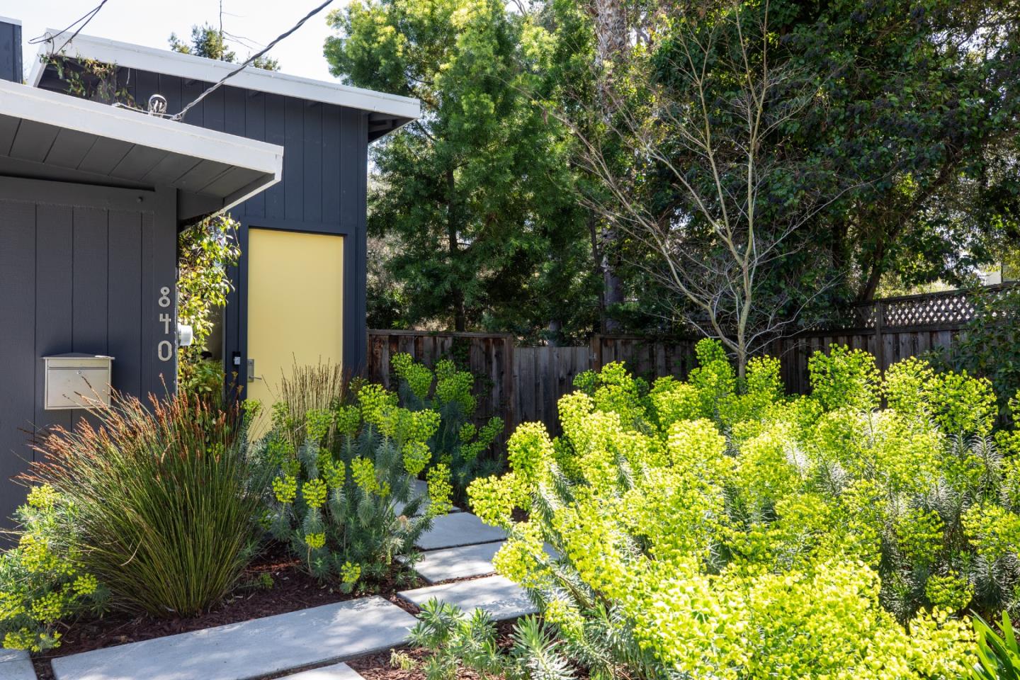 840 Sutter Avenue Palo Alto, CA 94303 - Photo 2 of 26 a front view of a house with a yard
