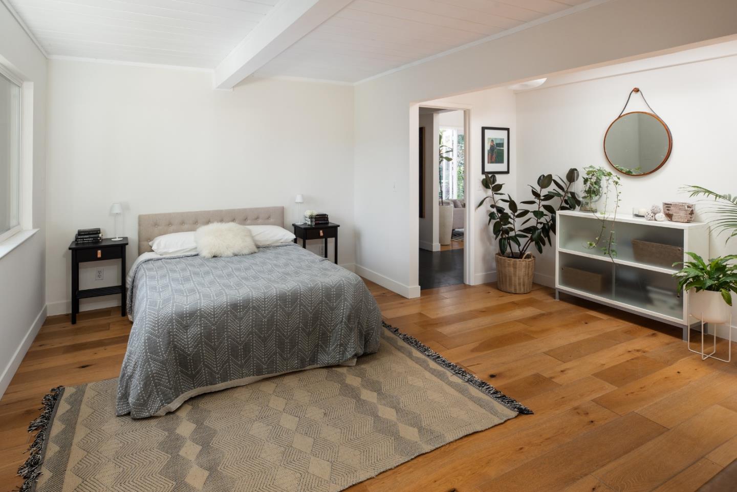 840 Sutter Avenue Palo Alto, CA 94303 - Photo 23 of 26 a bedroom with a bed and a dresser