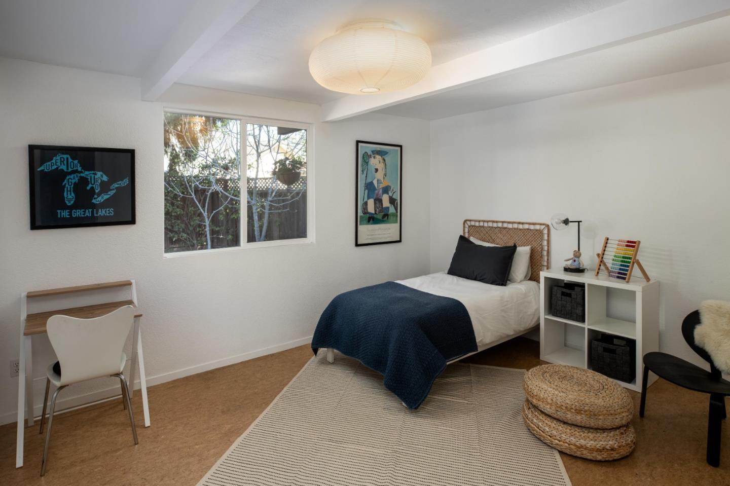 840 Sutter Avenue Palo Alto, CA 94303 - Photo 26 of 26 a bedroom with a bed and a chair