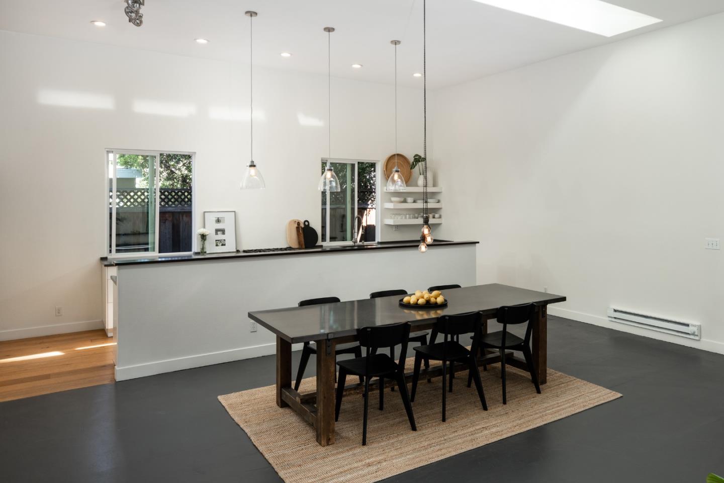 840 Sutter Avenue Palo Alto, CA 94303 - Photo 6 of 26 a view of a dining room with furniture and wooden floor
