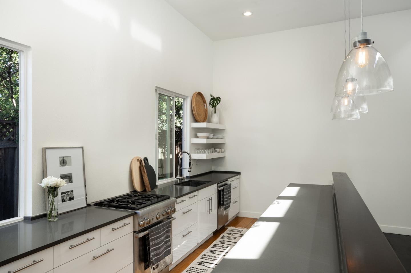 840 Sutter Avenue Palo Alto, CA 94303 - Photo 8 of 26 a kitchen with a sink and cabinets