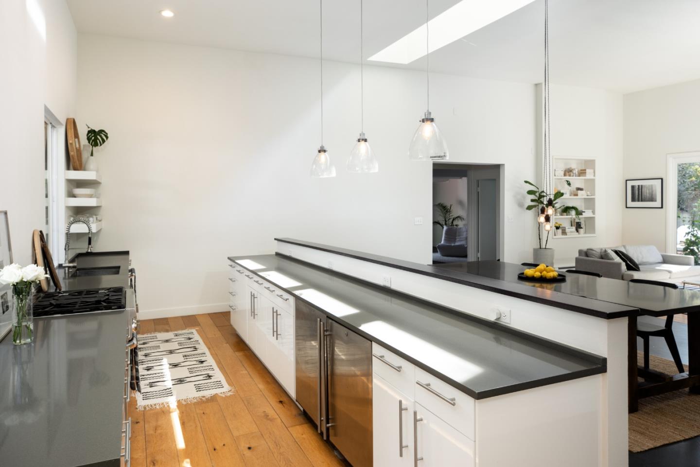 840 Sutter Avenue Palo Alto, CA 94303 - Photo 9 of 26 a kitchen with stainless steel appliances granite countertop a sink stove and cabinets