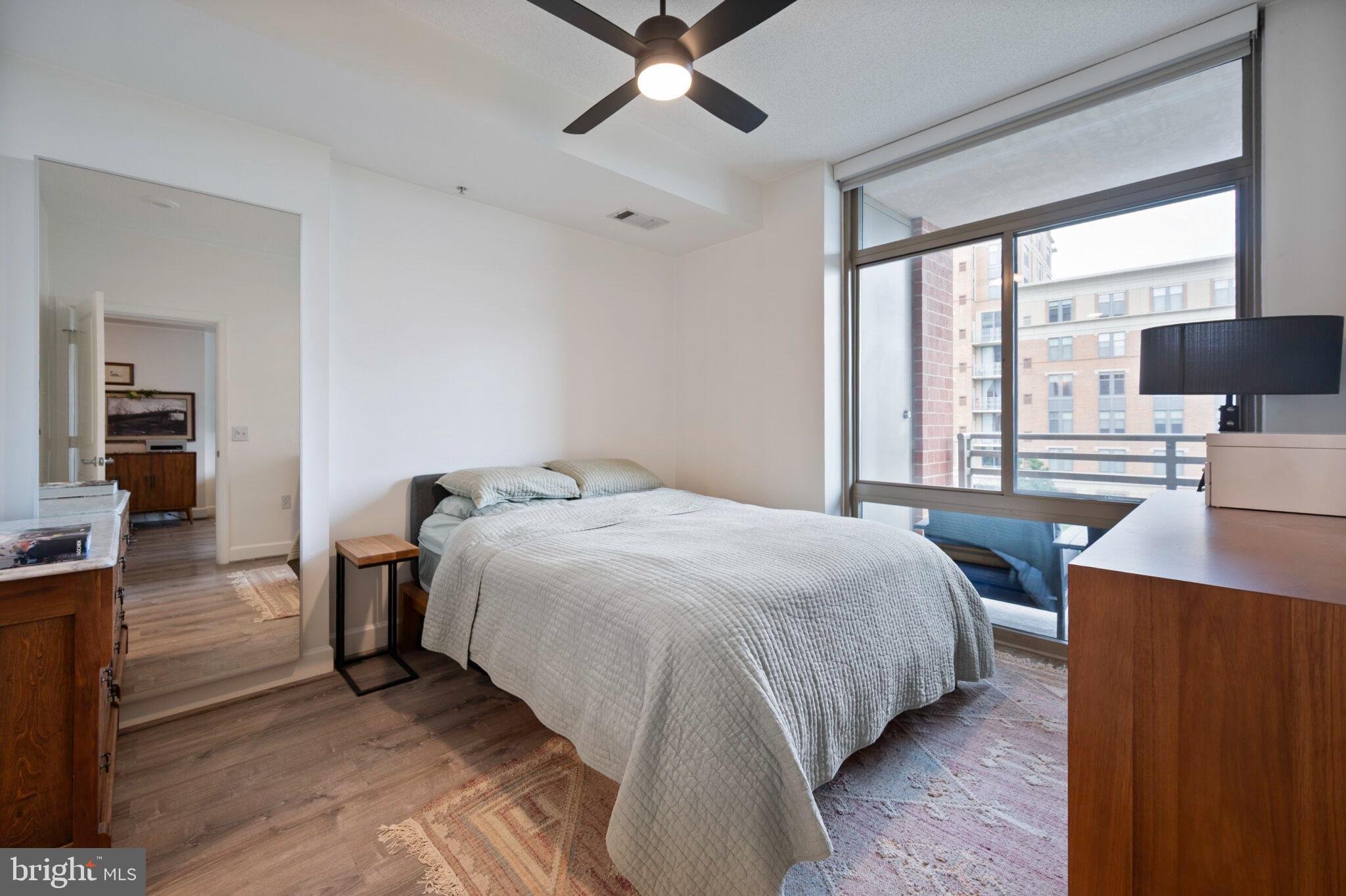 3650 South Glebe Road, Unit 450 Arlington, VA 22202 - Photo 20 of 60 a bedroom with a bed and a desk